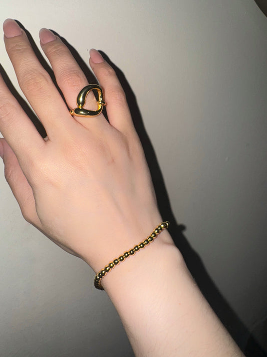 PULSERA ROUND DORADO