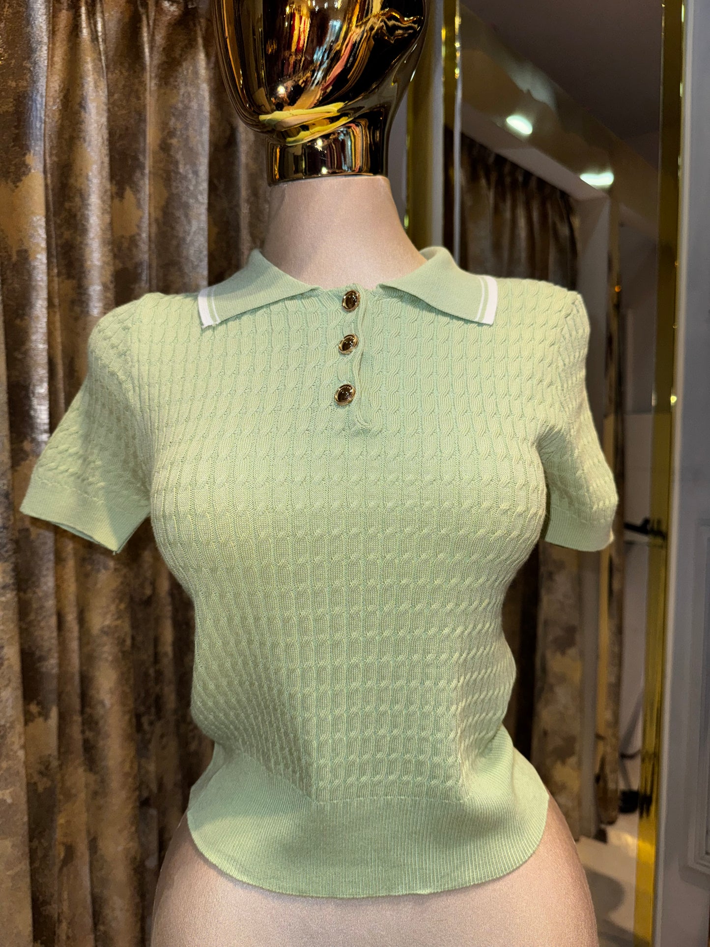 BLUSA TRENZA BOTÓN DORADO